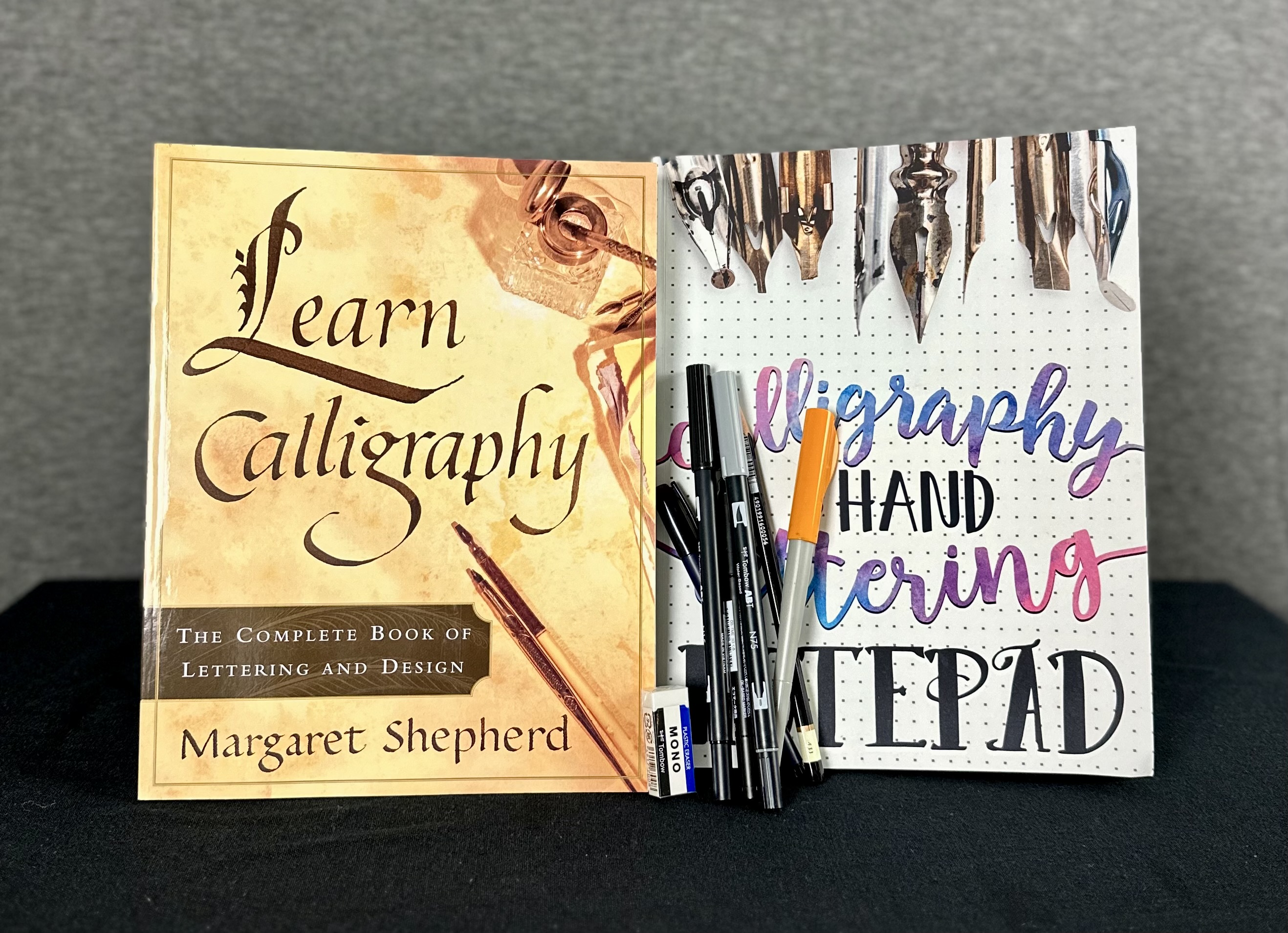 Calligraphy pens and drawing books