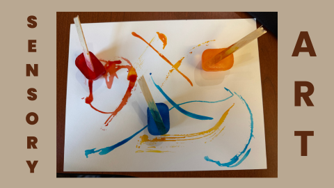 Ice cube paints with popsicle stick handles